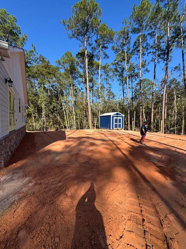 Graded dirt pad